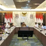 Menteri Karding dan Menko Airlangga Bahas Juknis Pencairan KUR PMI