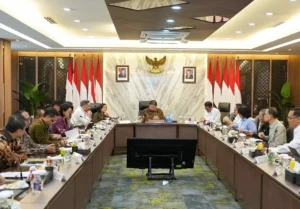 Menteri Karding dan Menko Airlangga Bahas Juknis Pencairan KUR PMI